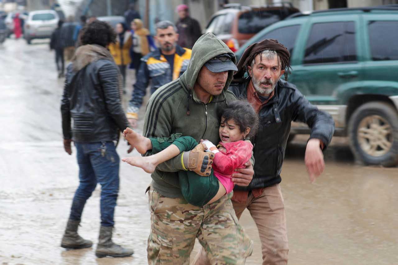 Quake kills over 1,200 across Turkey, Syria
